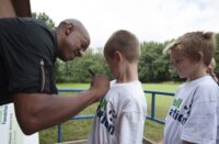 ff-ambassador-dion-dublin-signs-shirts