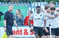 MATCHWINNER: Hooper celebrates his goal with his Hungerford team-mates PICTURE: Gary Learmouth